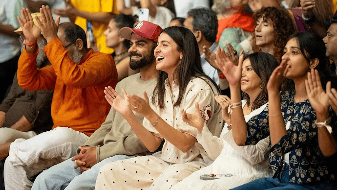 Hours after India’s defeat against New Zealand in the first Test, Virat Kohli and Anushka Sharma travel to Mumbai to attend Krishna Das Kirtan.